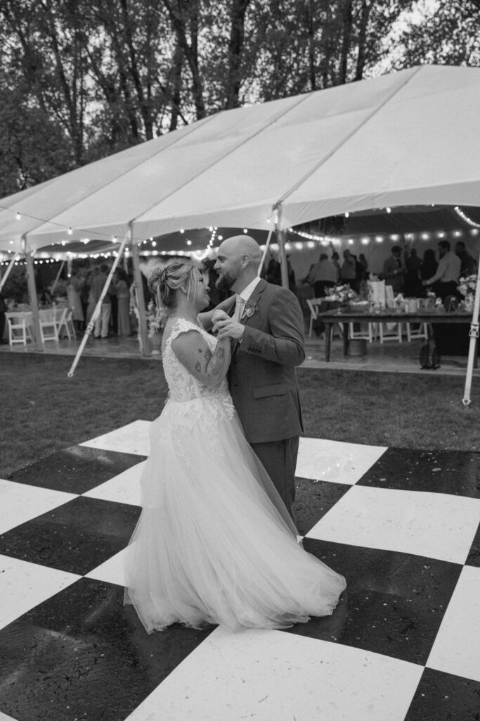 Bride and Groom having their first dance at The Cottage at River Bend in Eagle, ID